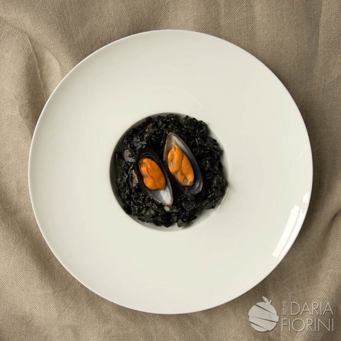  Risotto al nero di seppia con mix di mare